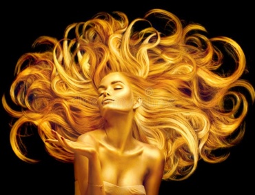 golden beauty woman sexy model girl golden makeup long hair pointing hand over black metallic gold glowing skin golden 150668962